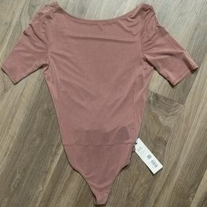 Lululemon pink backless bodysuit NWT